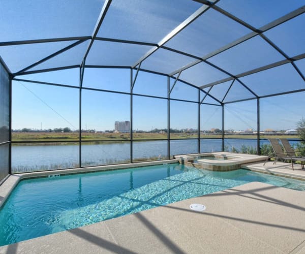 Photo 1 - GREAT LOCATION..MINUTES TO DISNEY, GAMEROOM, LAKEFRONT, 2 MASTER SUITES, HOT TUB