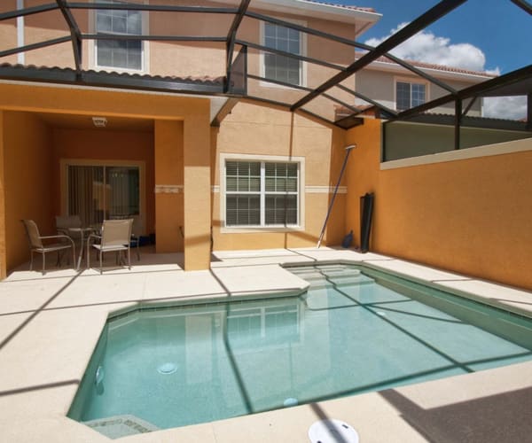 Photo 1 - SOUTH FACING POOL, SPACIOUS, CLOSE TO DISNEY, GATED RESORT COMMUNITY, FLAT SCREEN TV IN EVERY ROOM!